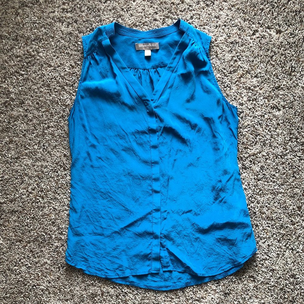 Blue Silk Sleeveless Blouse with Hidden Buttons